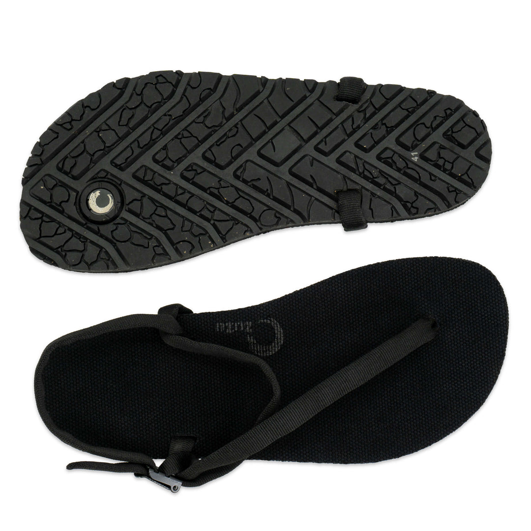 ZuZu Flex barefoot performance sandals with a canvas footbed and replaceable recycled black straps, designed for natural movement and all-day comfort- Top view